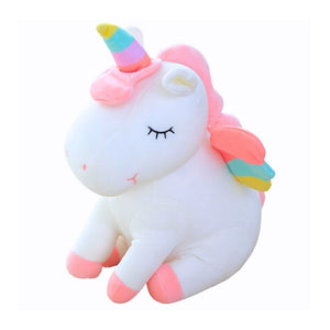 Peluche unicorno seduto